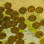 Economia Globale: L'Inflazione Incombe mentre i Mercati Valutano Scenari Geopolitici